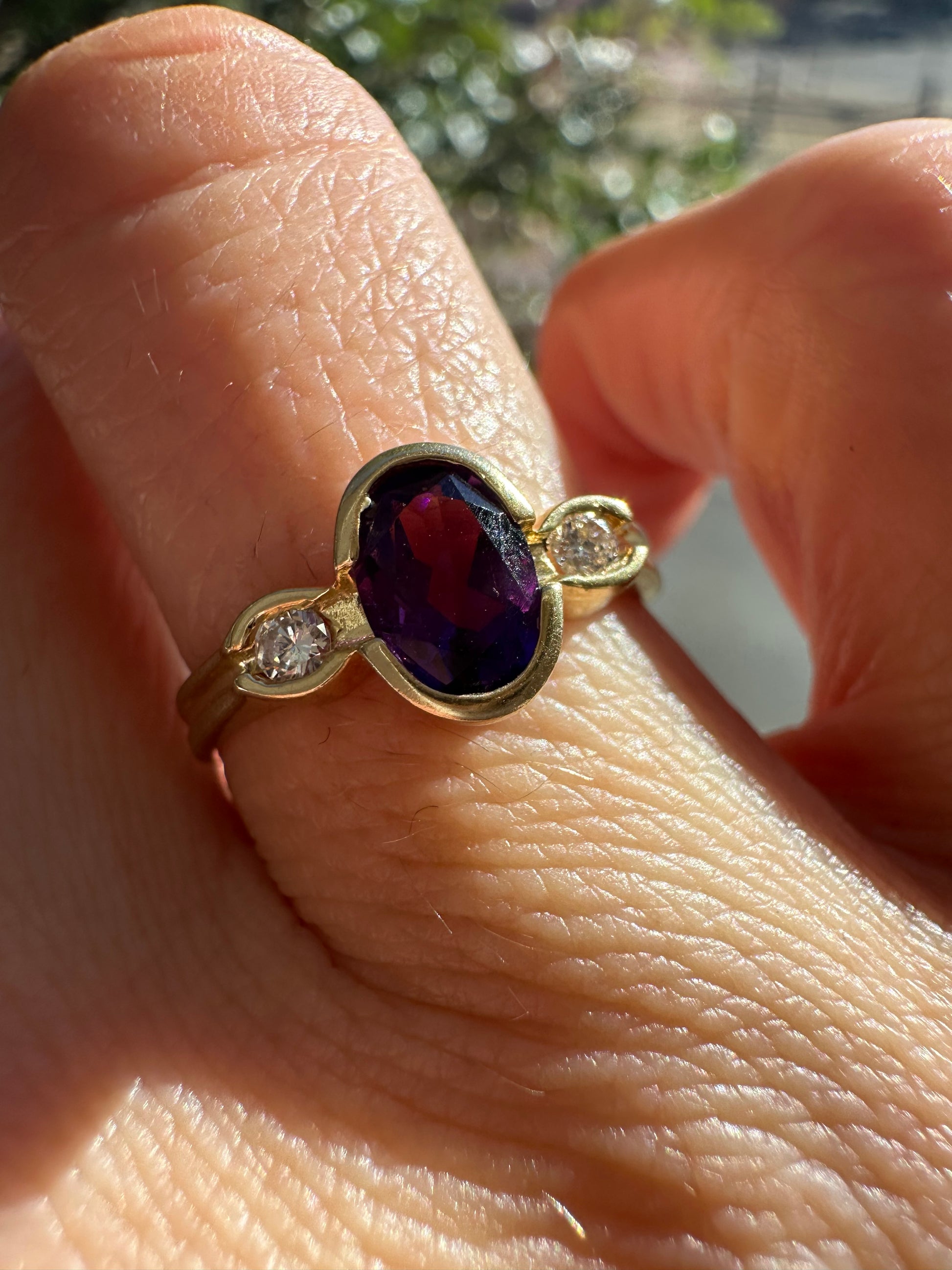 bezel set amethyst and diamond ring