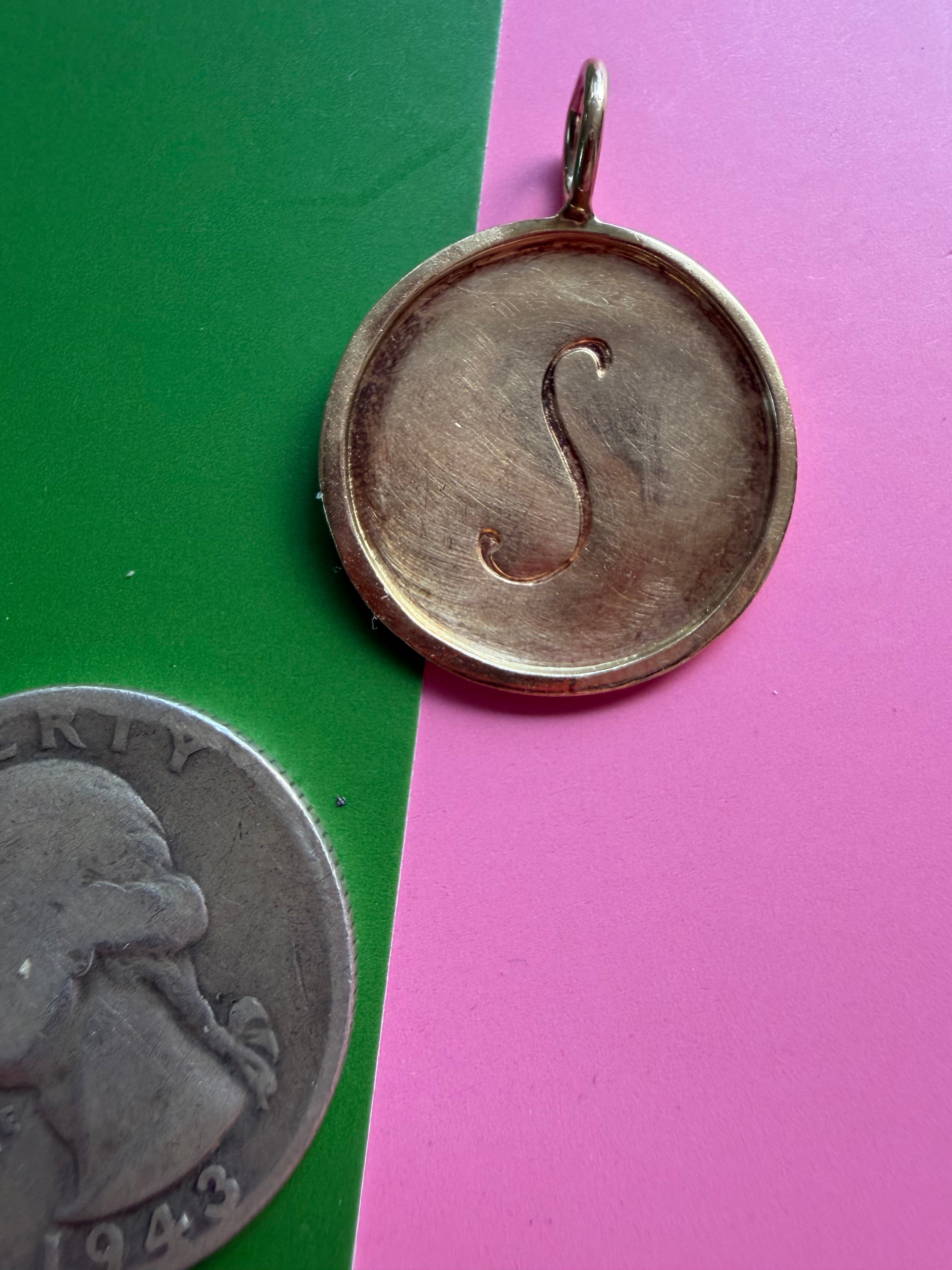 S medallion