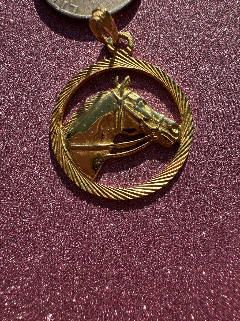 engine turned horse charm