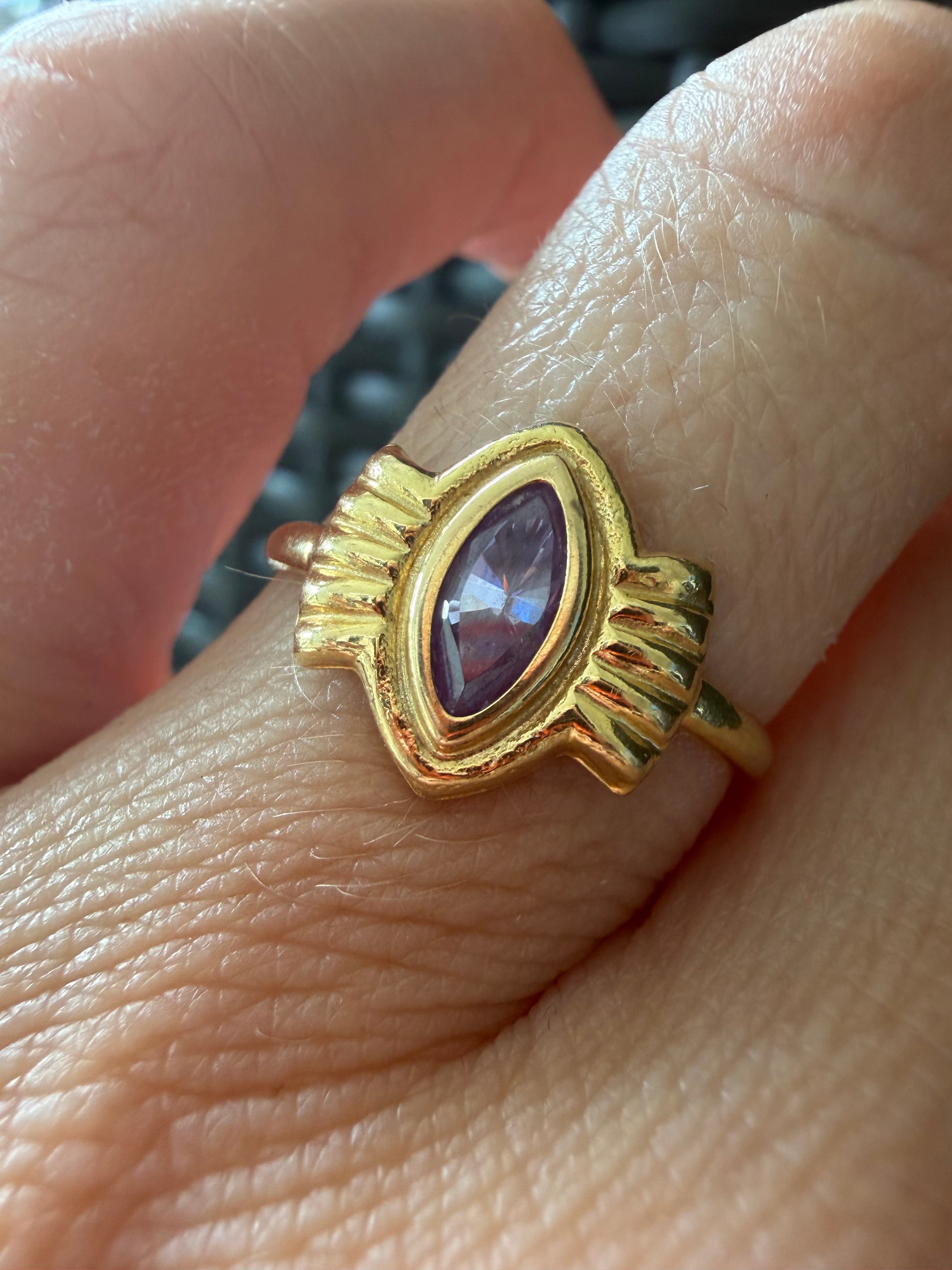 18k gold and purple stone
