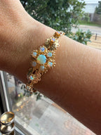 striking engraved opal burst hinge bangle
