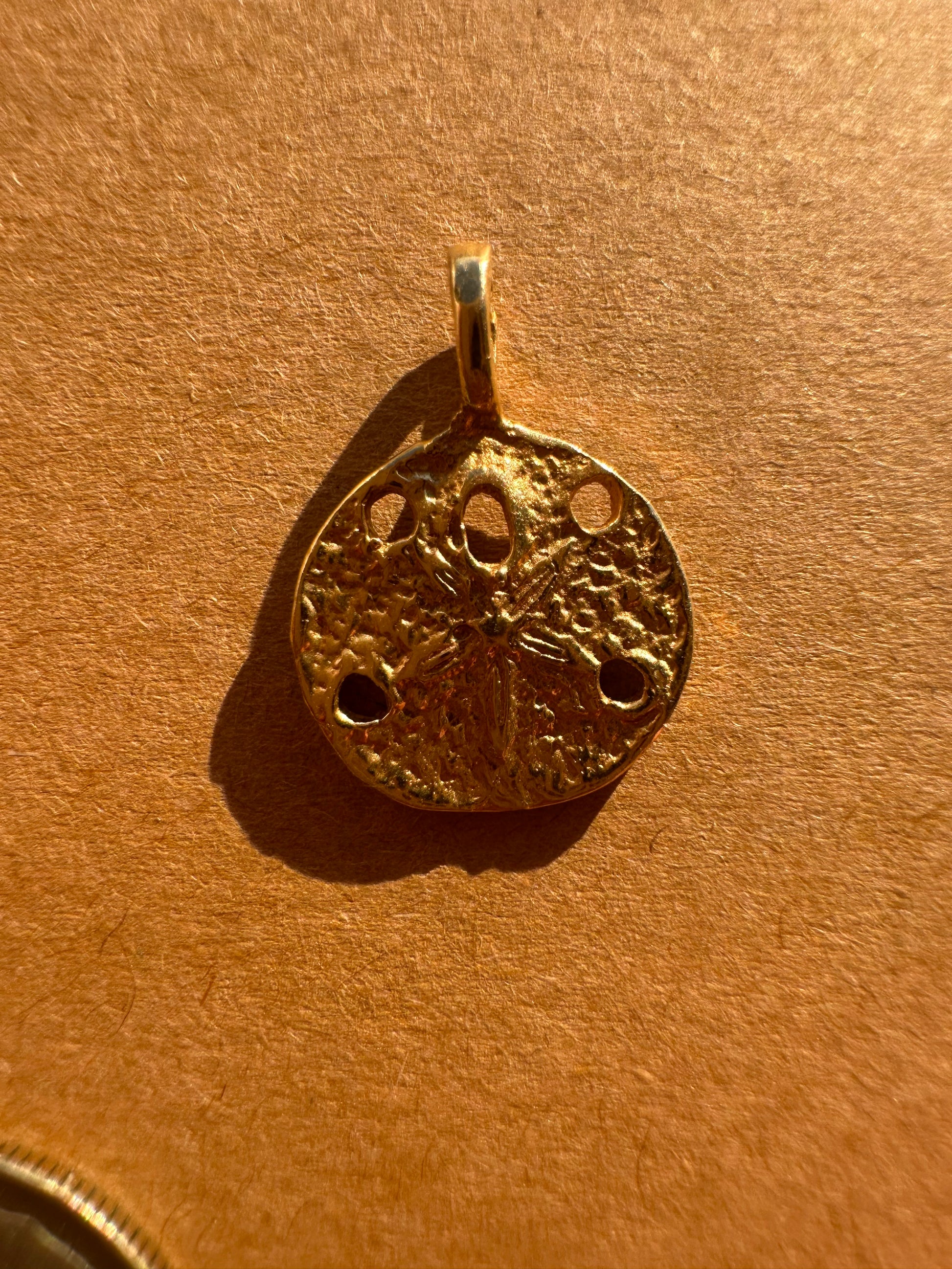 sanddollar - zuni bear - fluted clover charm