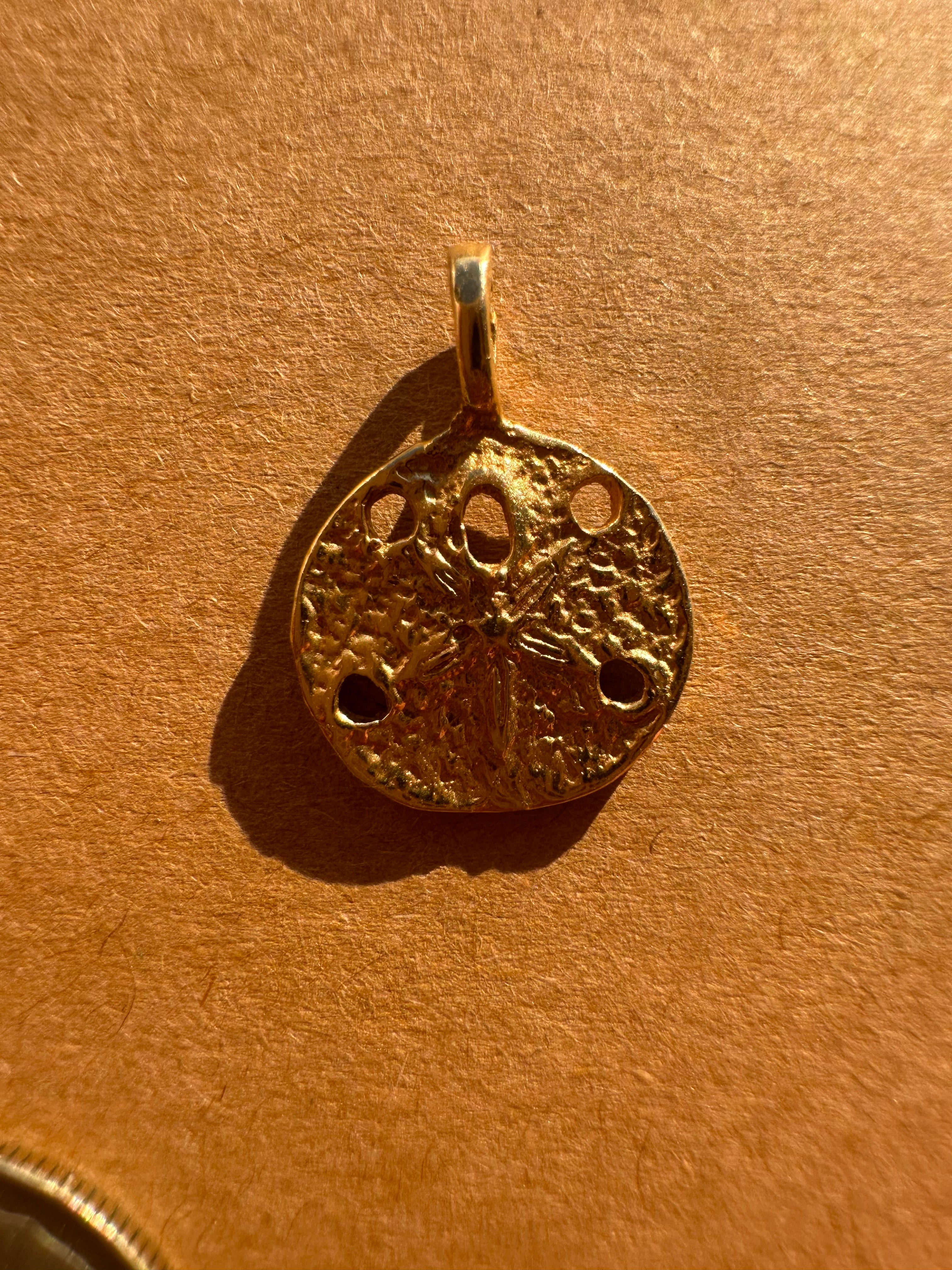 sanddollar - zuni bear - fluted clover charm
