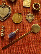 plethora of vintage gold charms