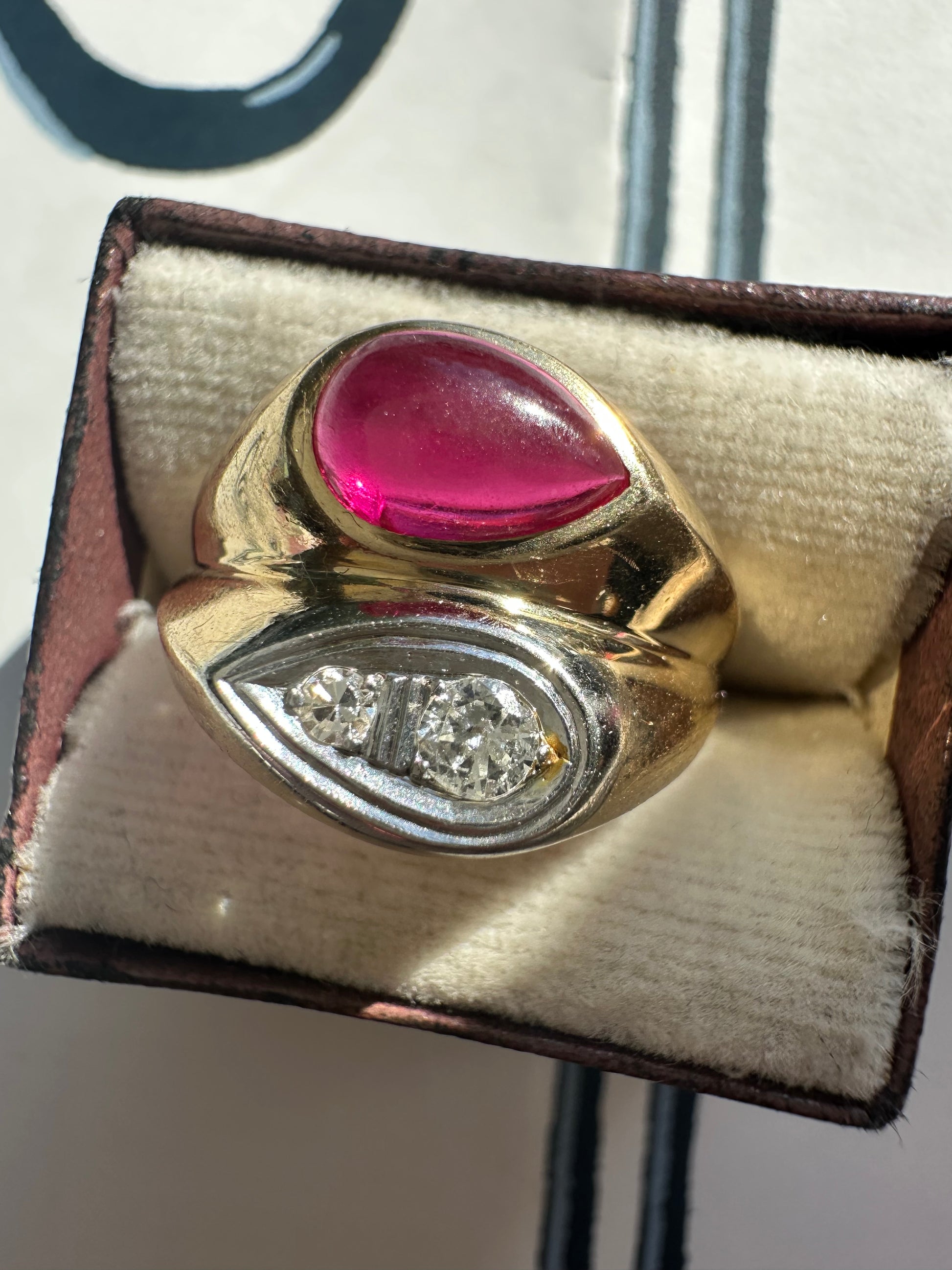 ruby cabochon and diamond side by side ring