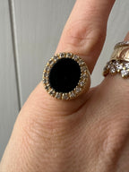 onyx and diamond oval signet style ring