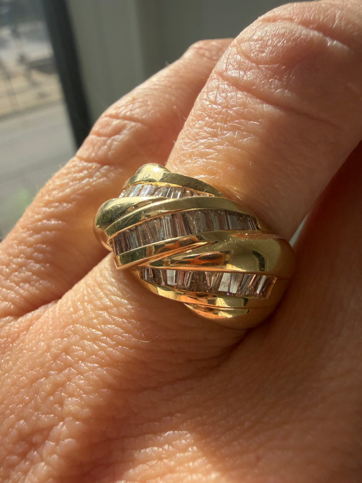 croissant style baguette diamond ring