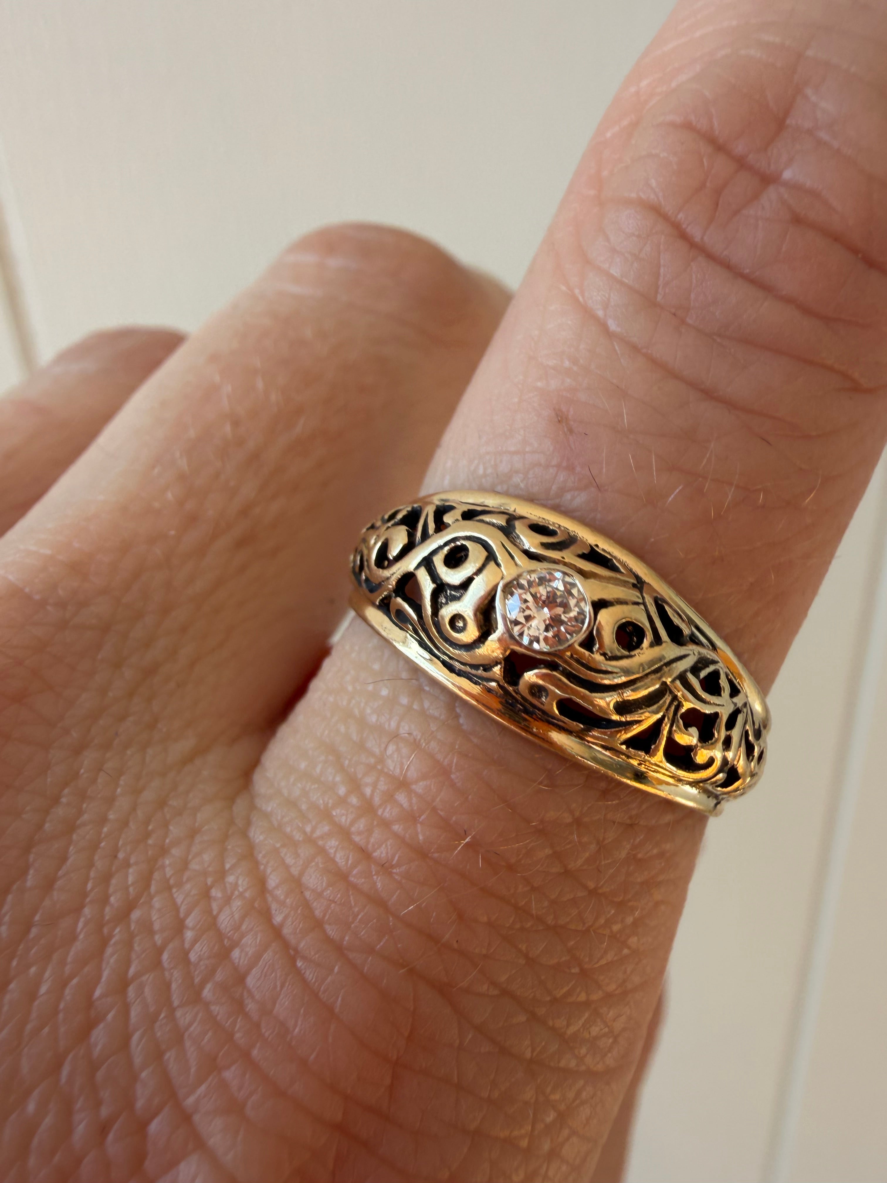 orange blossom dome ring with old euro cut diamond