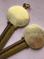 antique oval key pendant by Tiffany & Co.