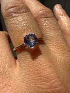 round cut solitaire tanzanite in 9k gold