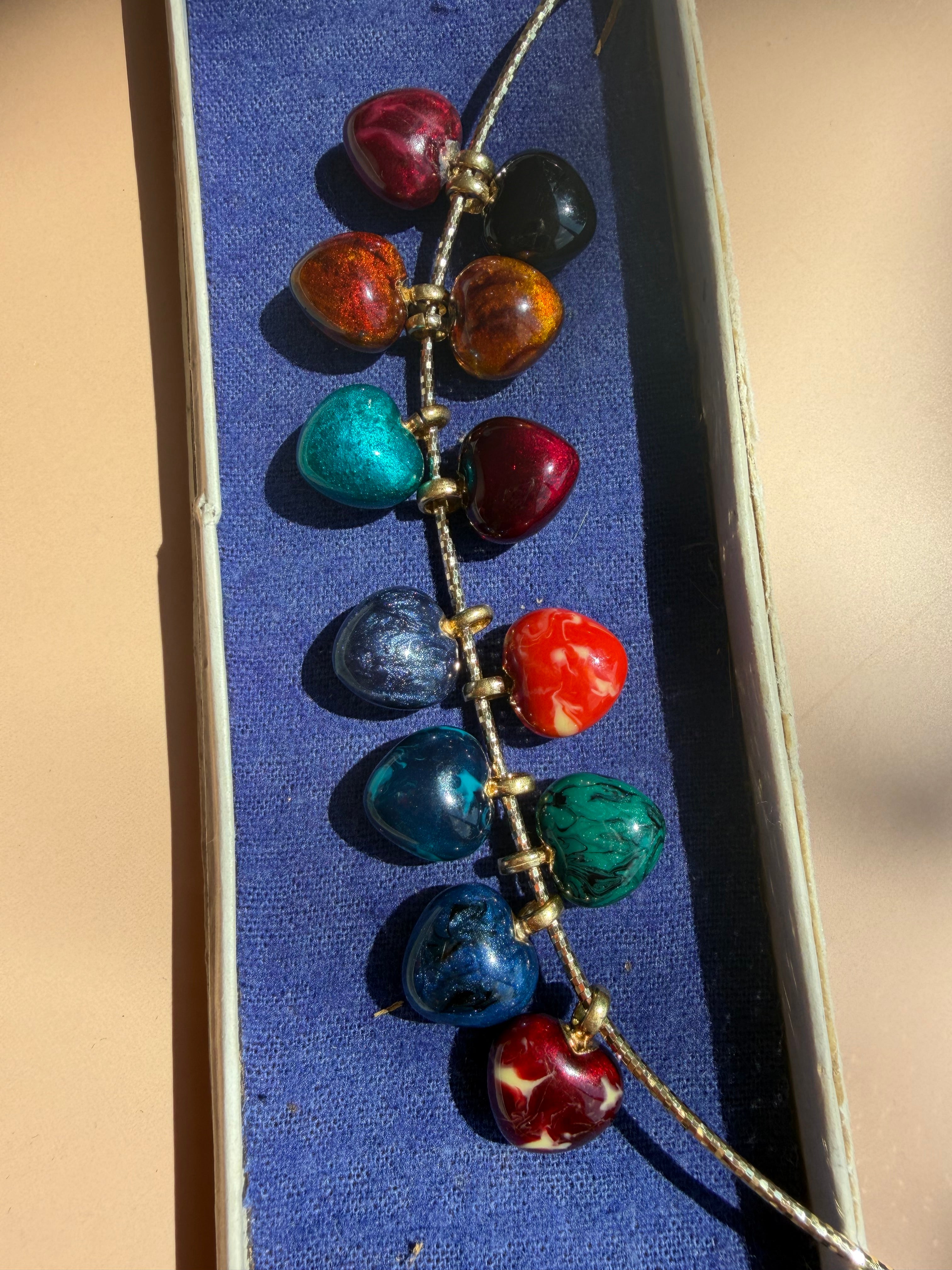 enamel hearts with 18k gold bail