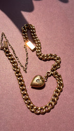 vintage/antique curb bracelet with star set single cut diamond heart