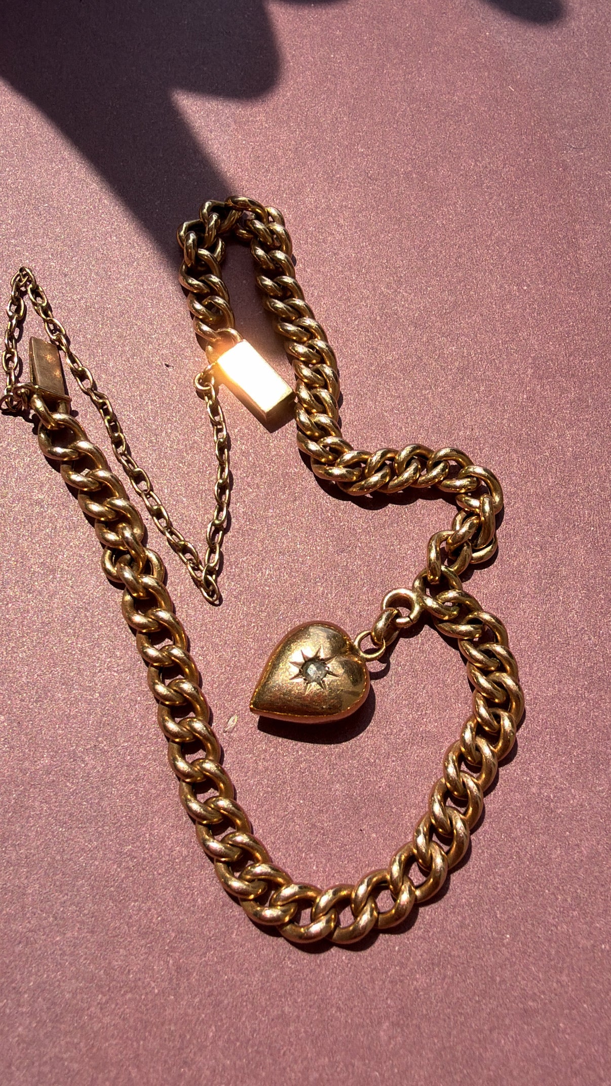 vintage/antique curb bracelet with star set single cut diamond heart