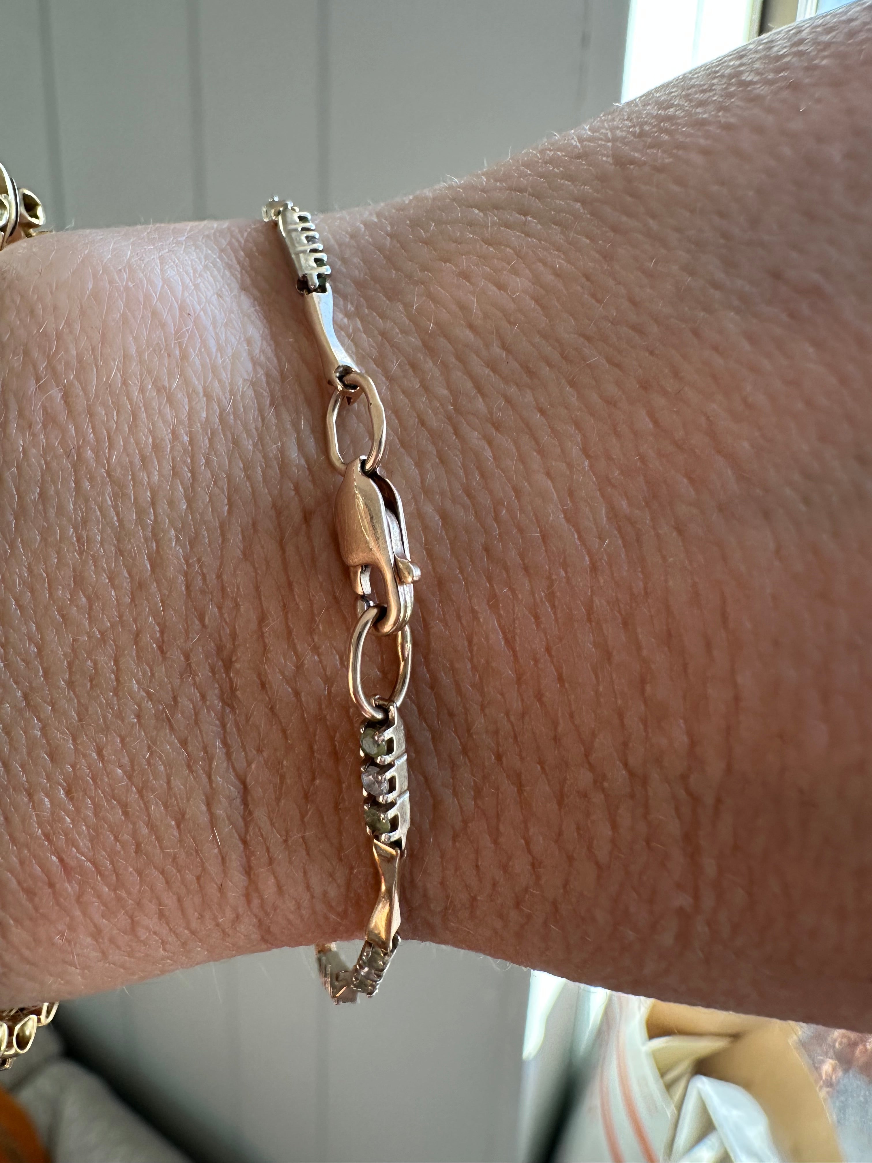 station bracelet with green and white gems