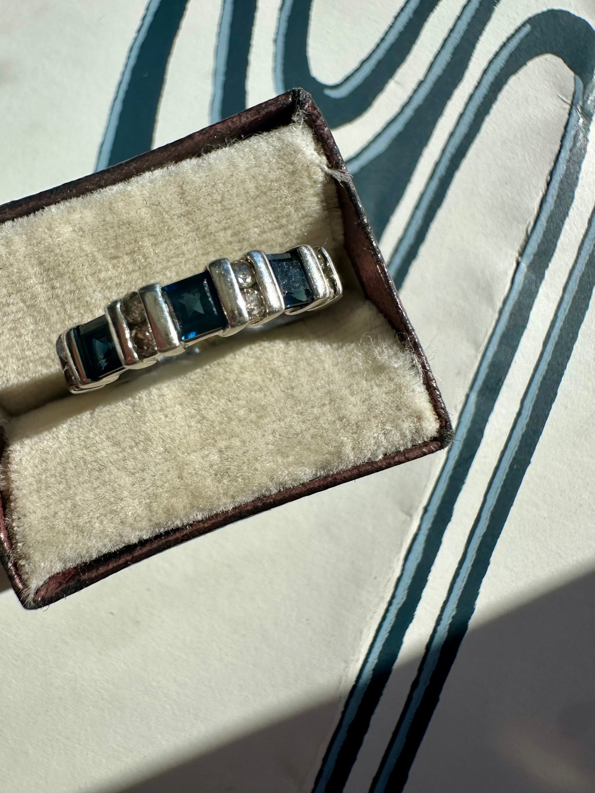 white gold diamond and sapphire ring