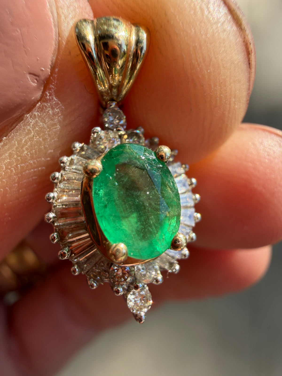 natural emerald and baguette diamond halo pendant