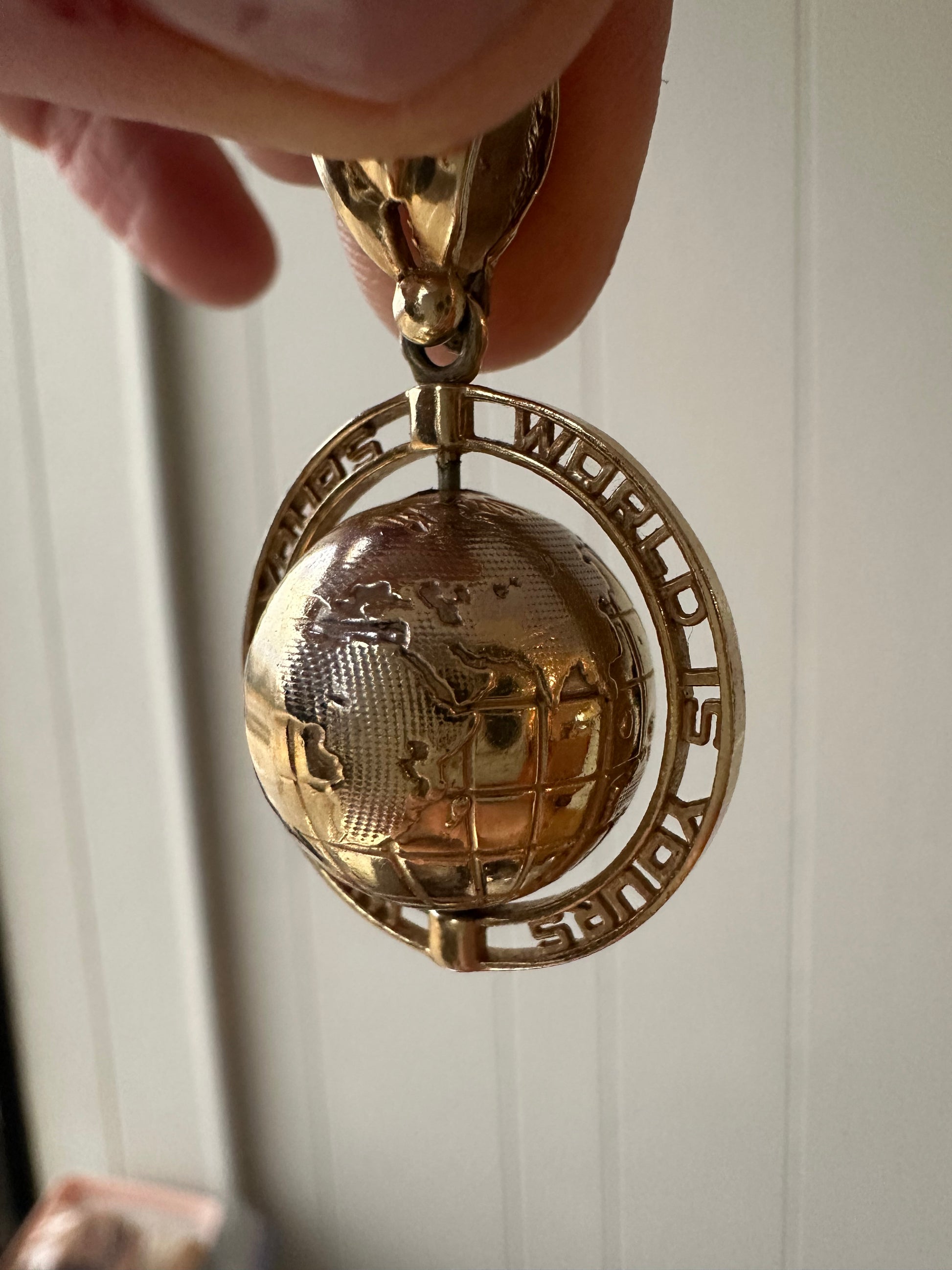 spinning globe charm