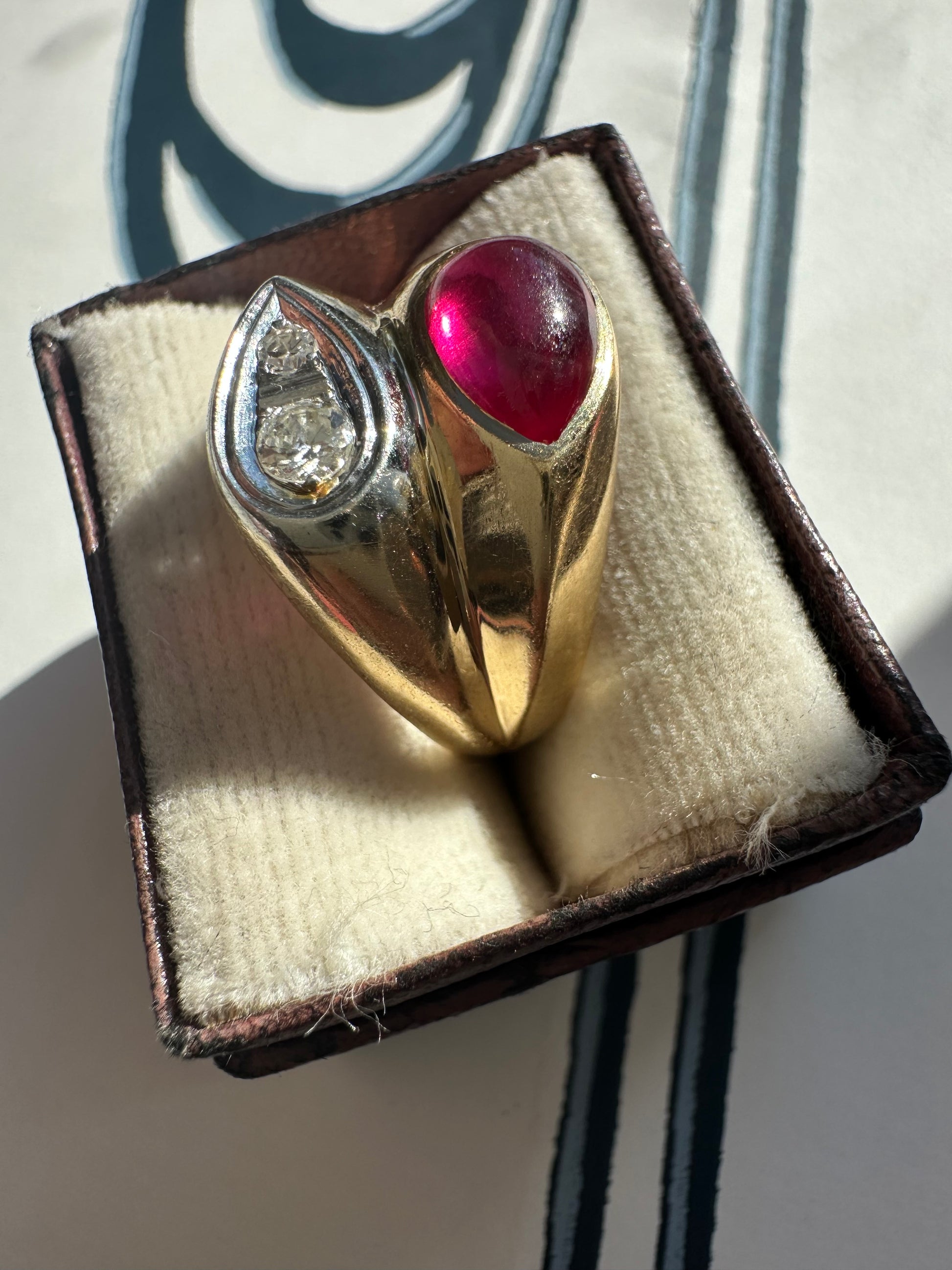 ruby cabochon and diamond side by side ring