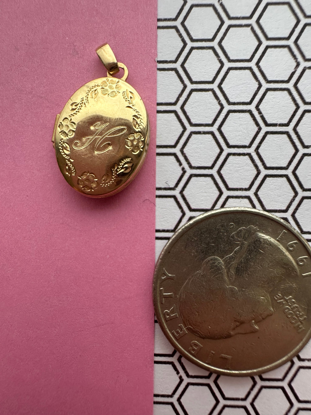 oval floral locket engraved H