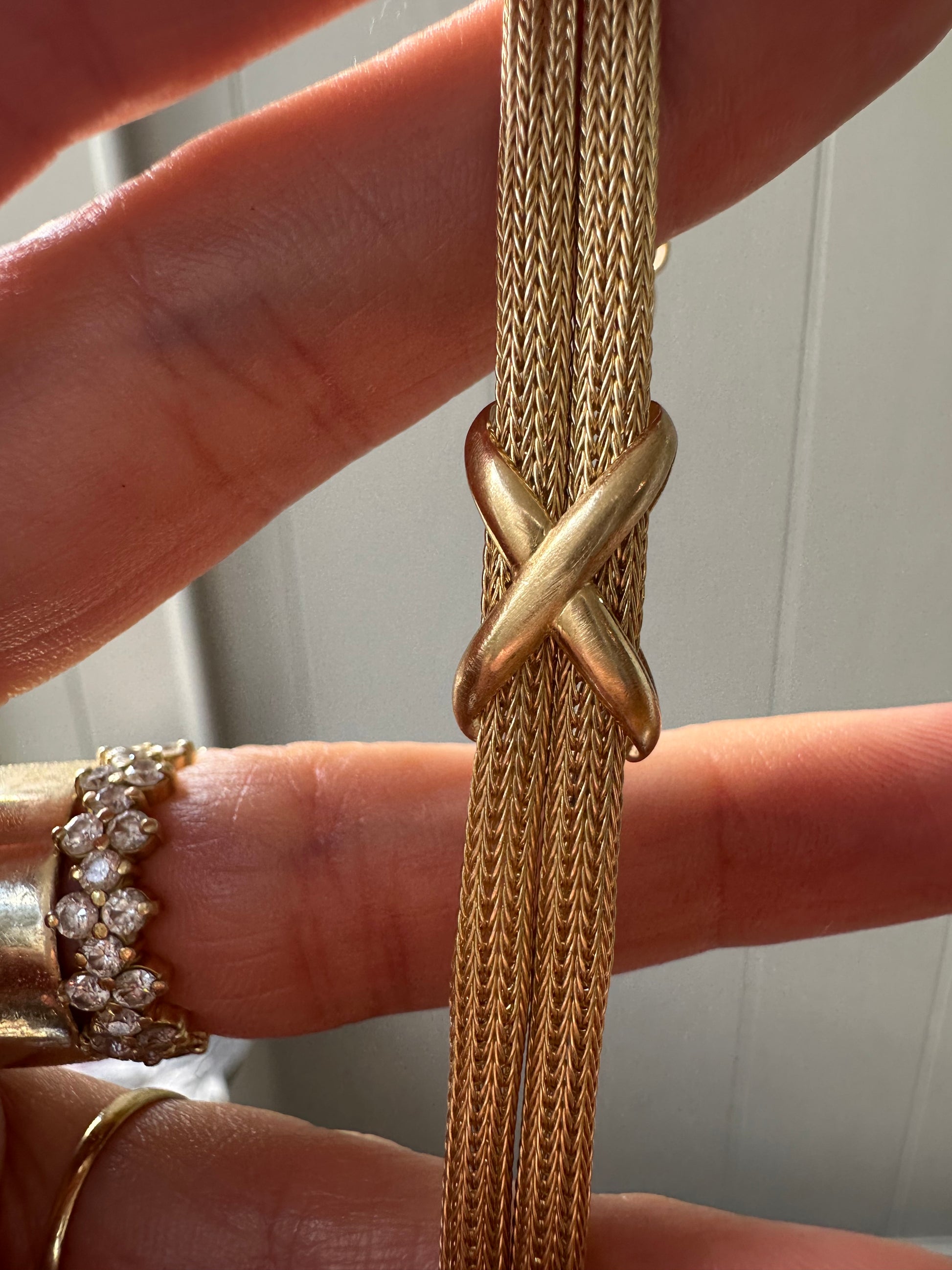 mesh bracelet with x and bar stations