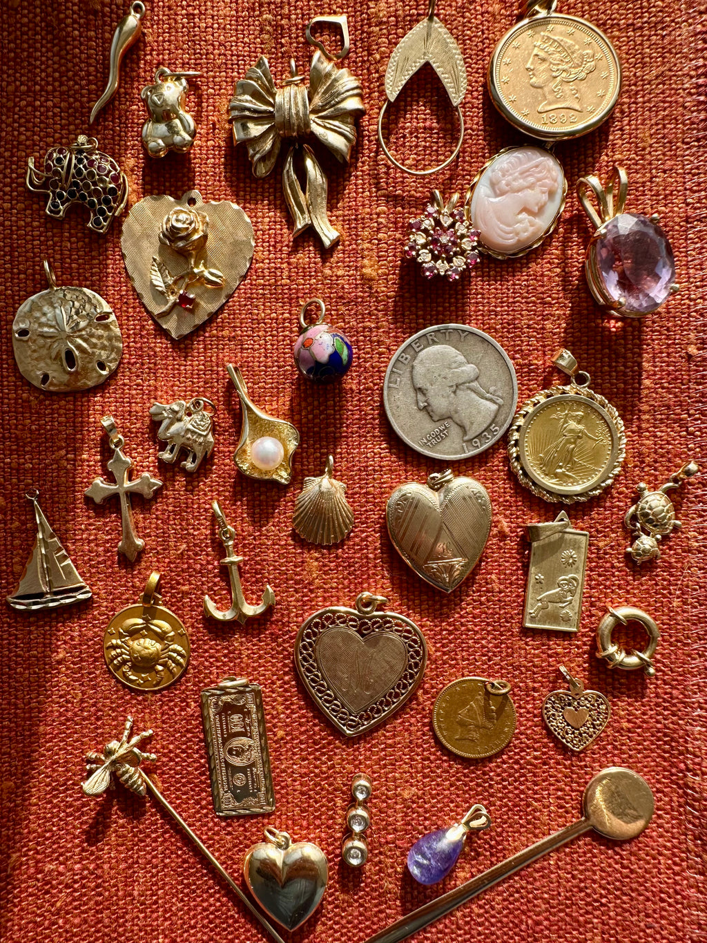 plethora of vintage gold charms