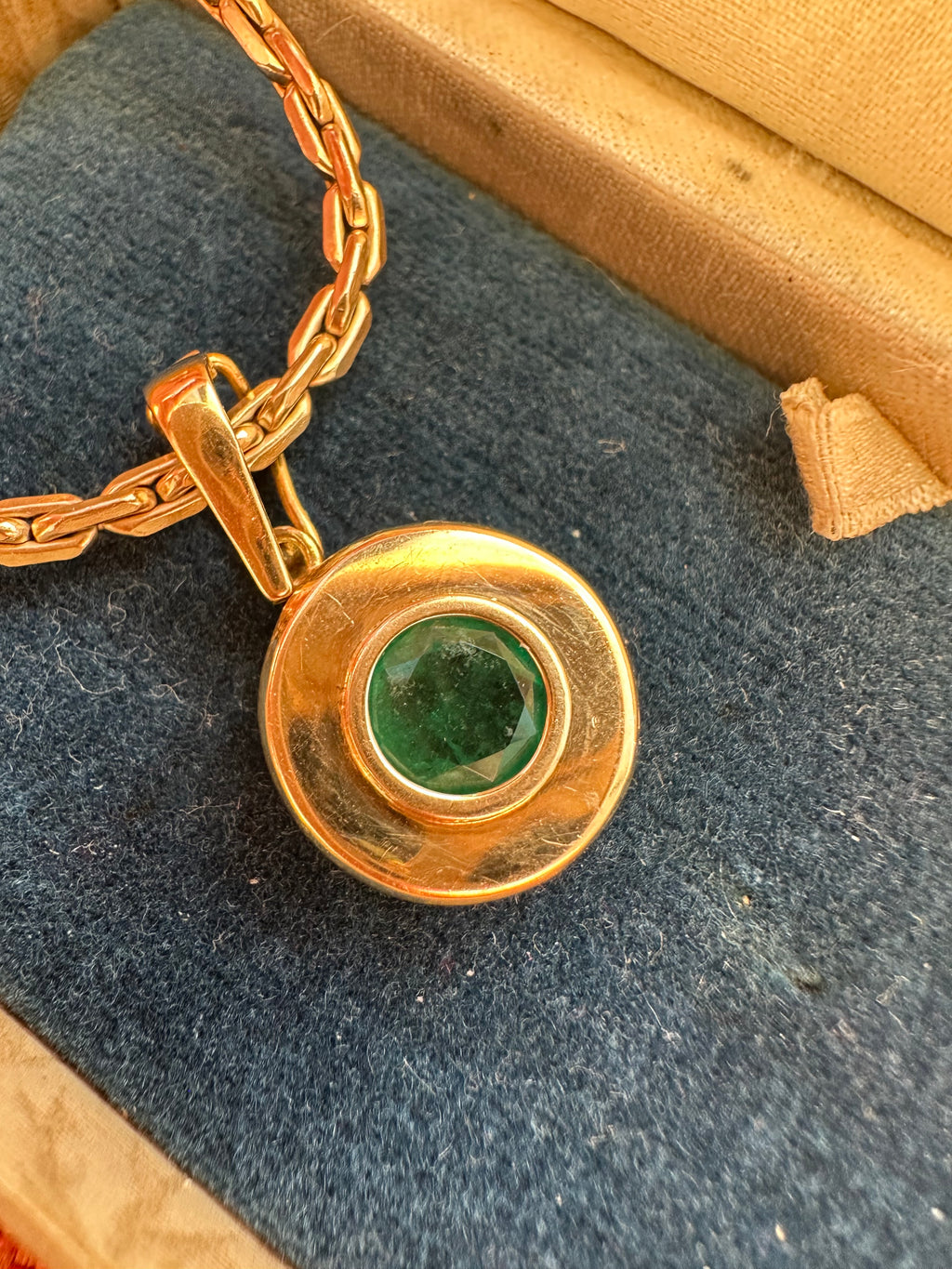 emerald in 18k bezel