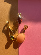 garnet // angel skin coral // opal pendants