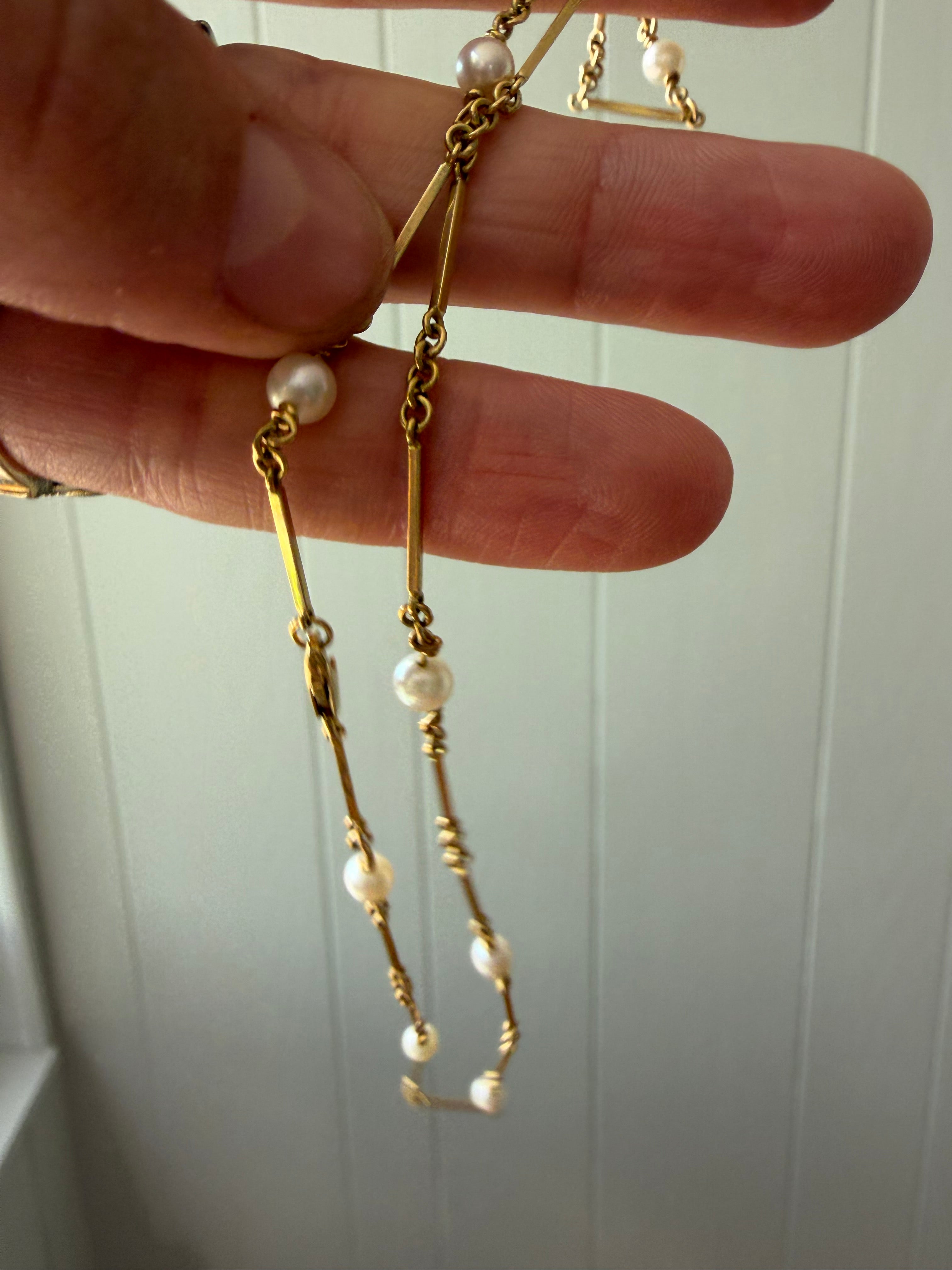 pearl and 18k gold station chain
