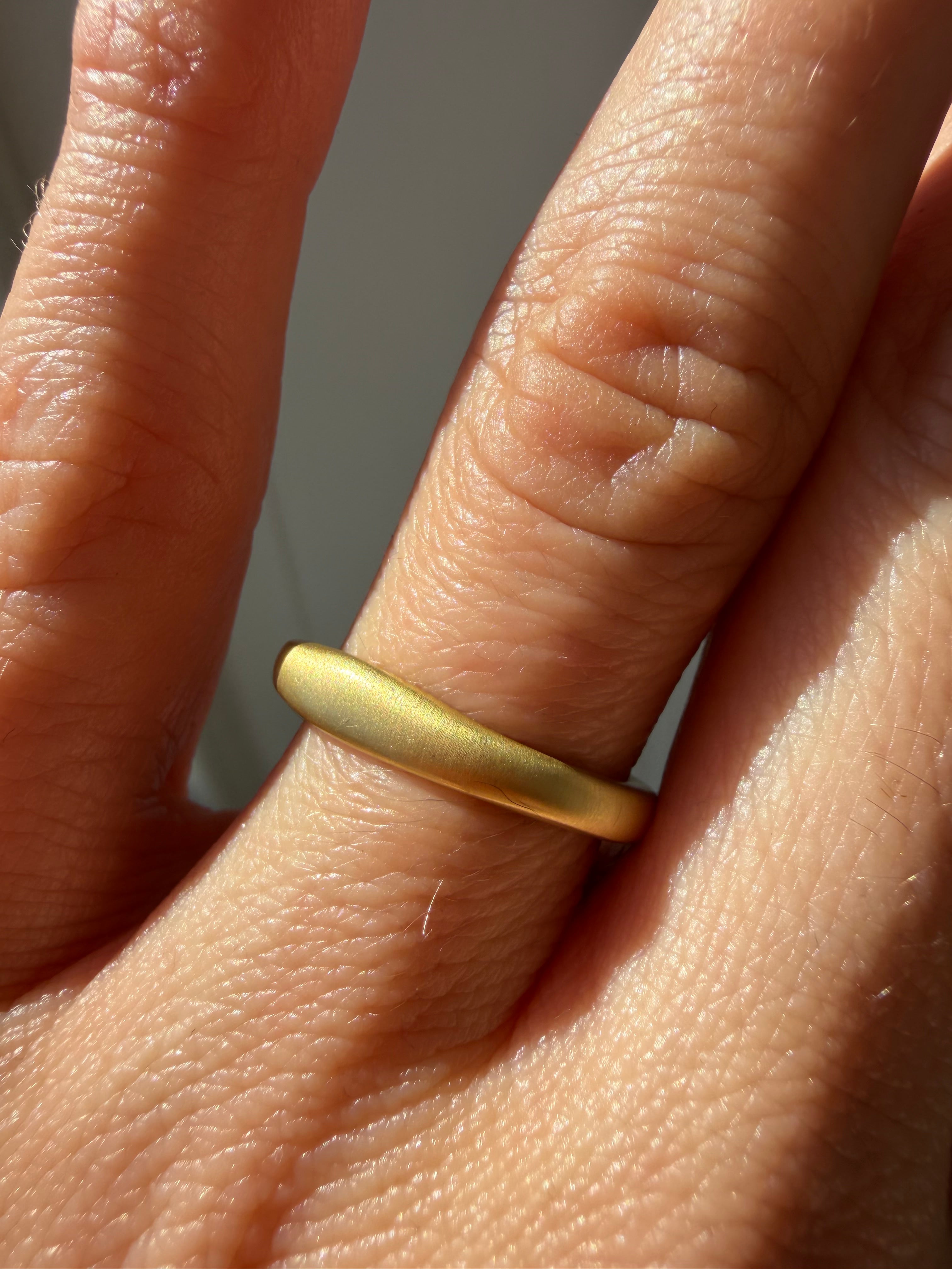 pair of 18k matte gold finish bands