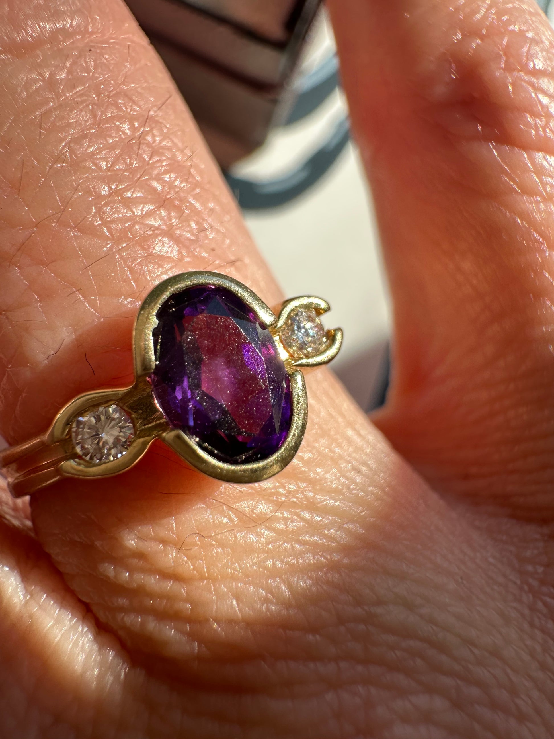 bezel set amethyst and diamond ring