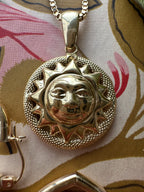 knurled textured sun charm