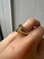 emerald and diamond navette style ring