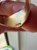 scrolly signet with faint engraving