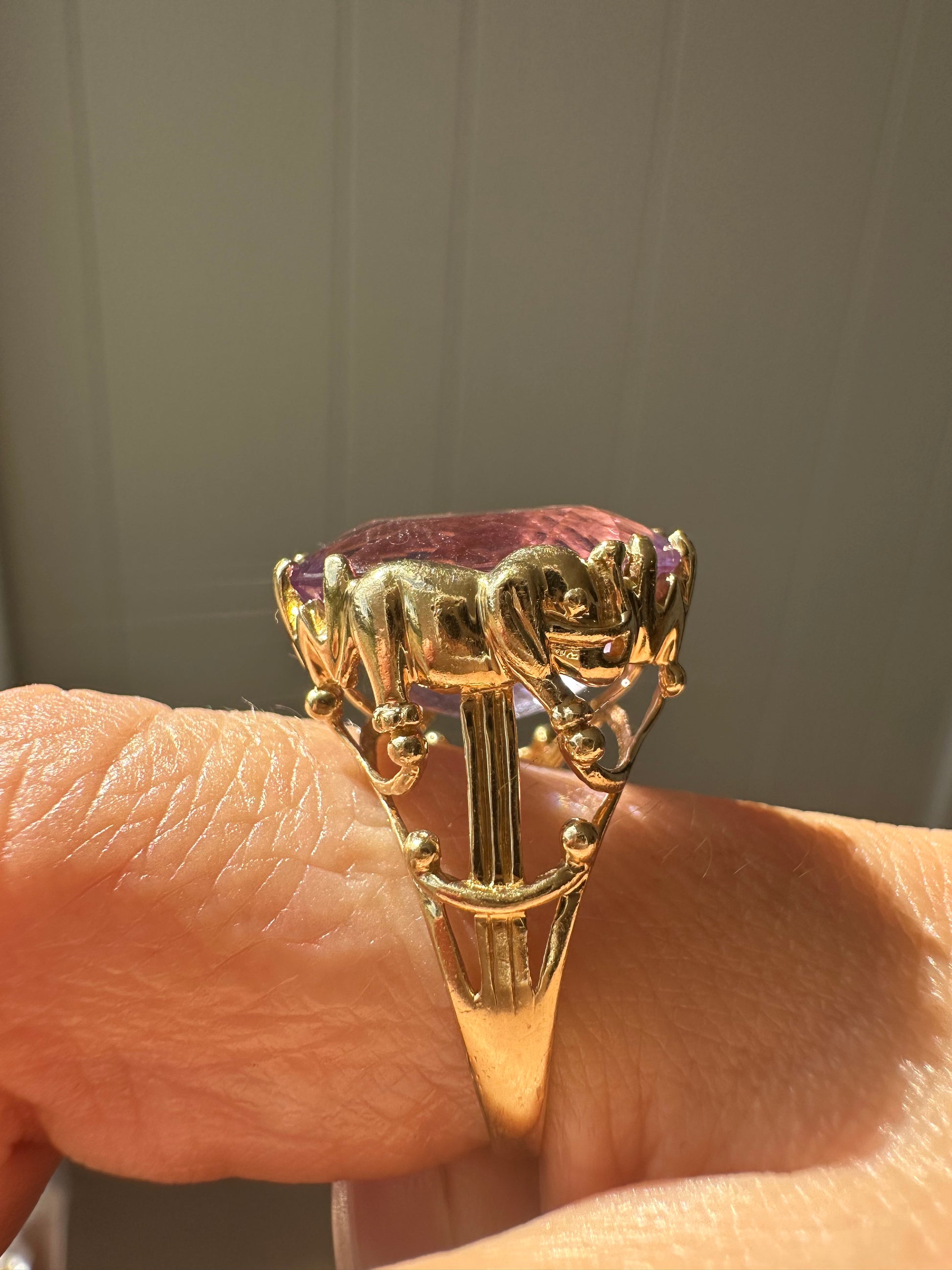 amethyst cocktail ring with elephant mounting