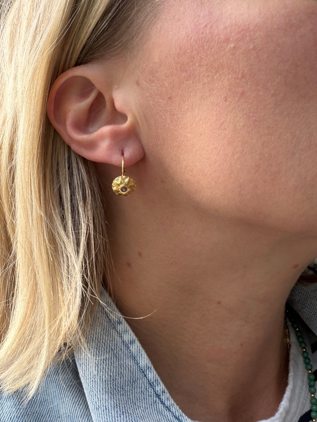 uno a erre 18k gold sun shape leverback