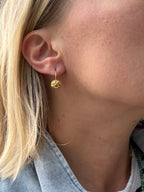 uno a erre 18k gold sun shape leverback