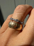 white gold and bezel set milgrain diamonds