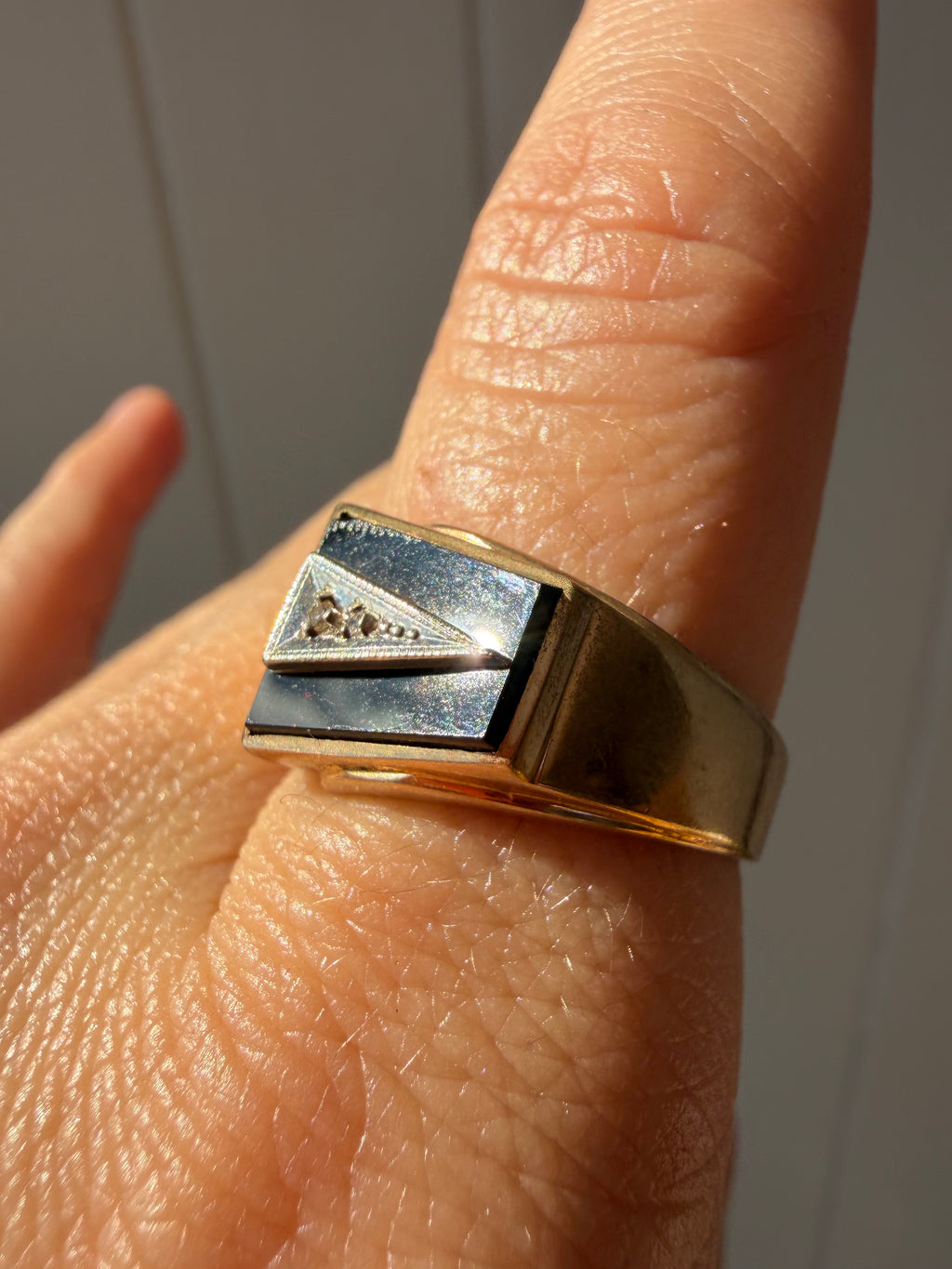 onyx and gold arrow ring