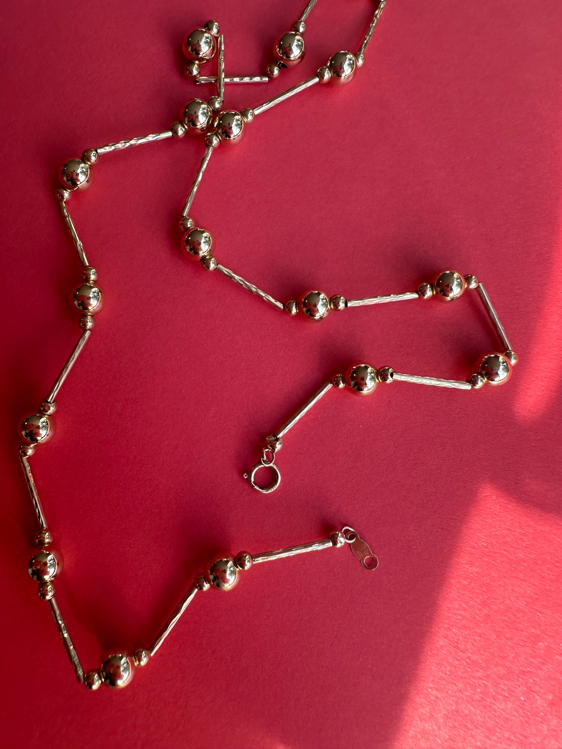 faceted bar and ball station chain