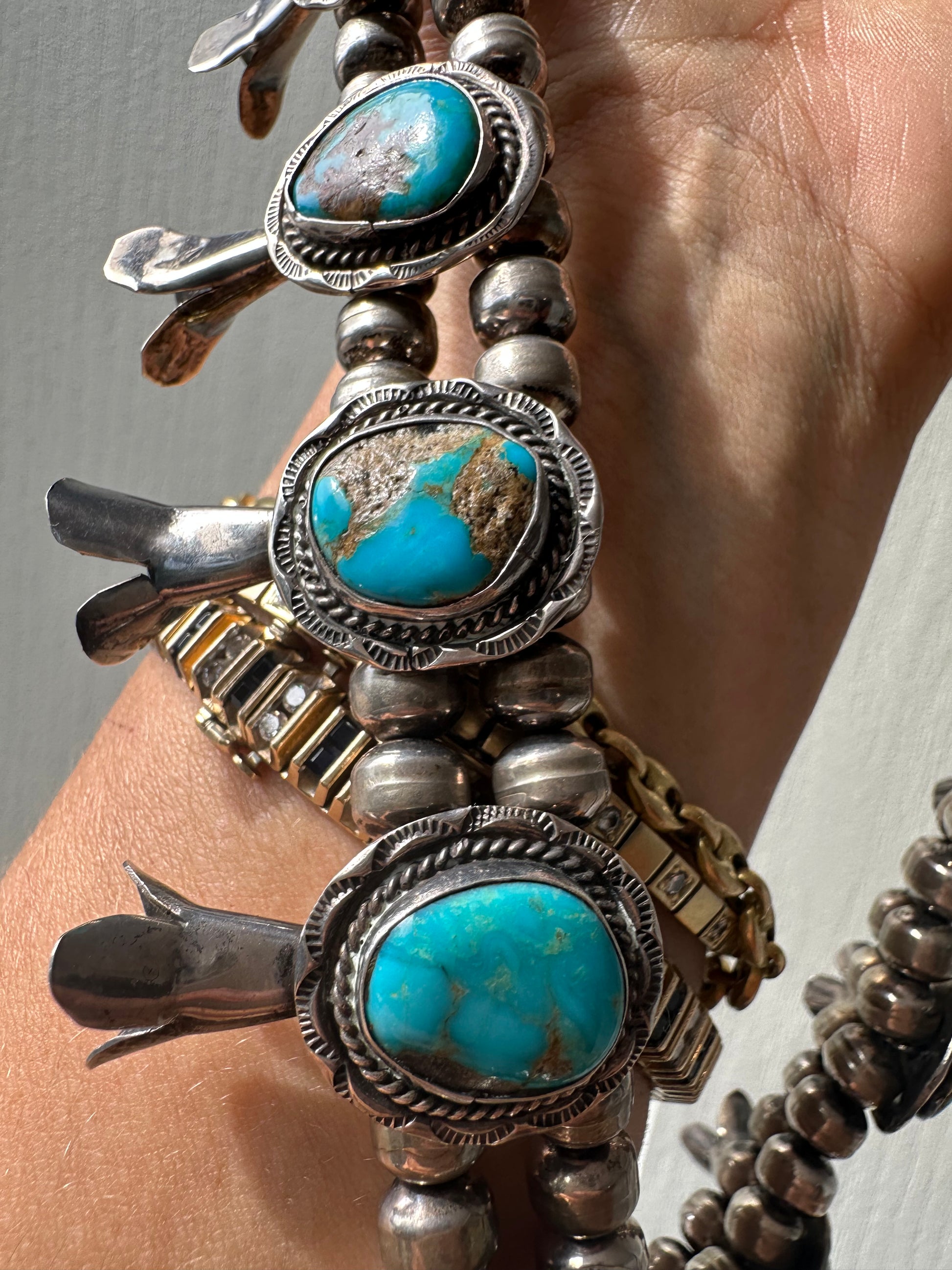 Sterling silver and turquoise vintage squash blossom