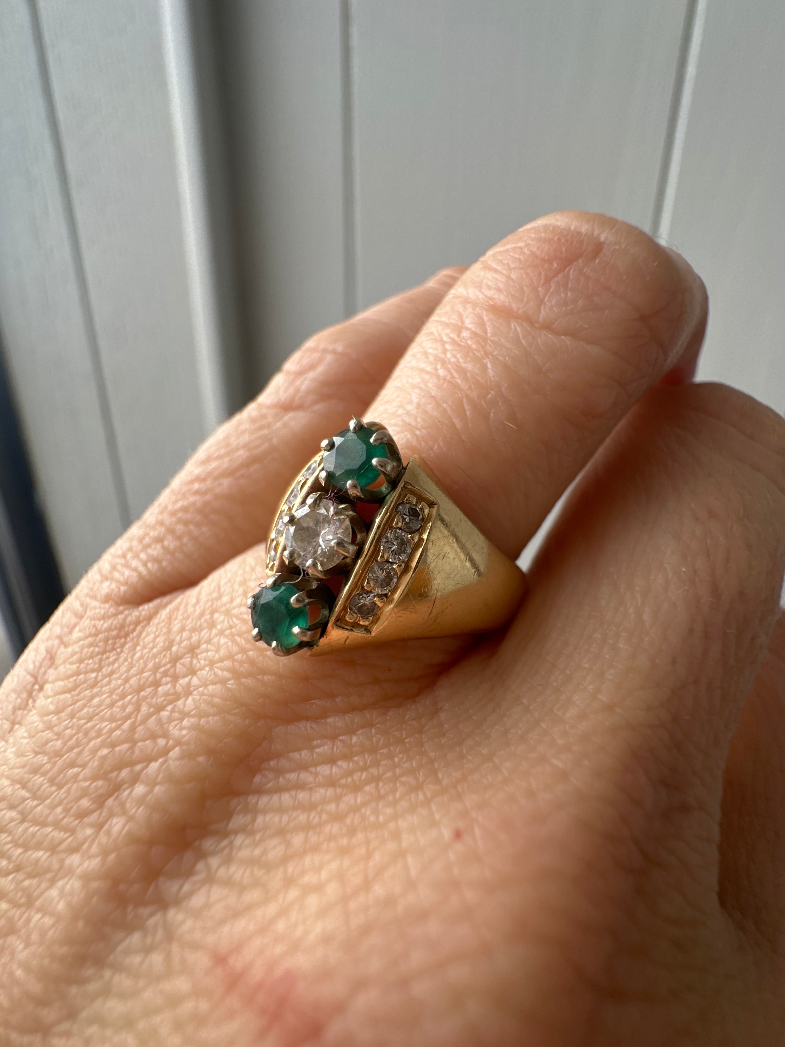 emerald and diamond navette style ring