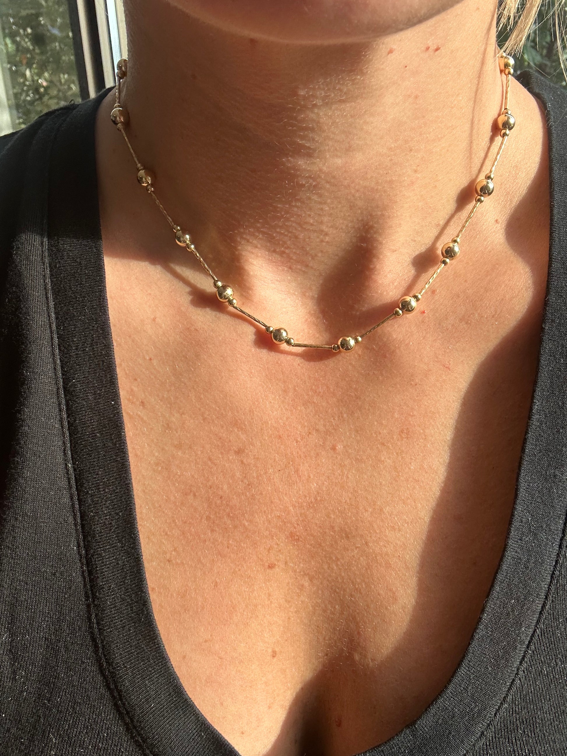 faceted bar and ball station chain