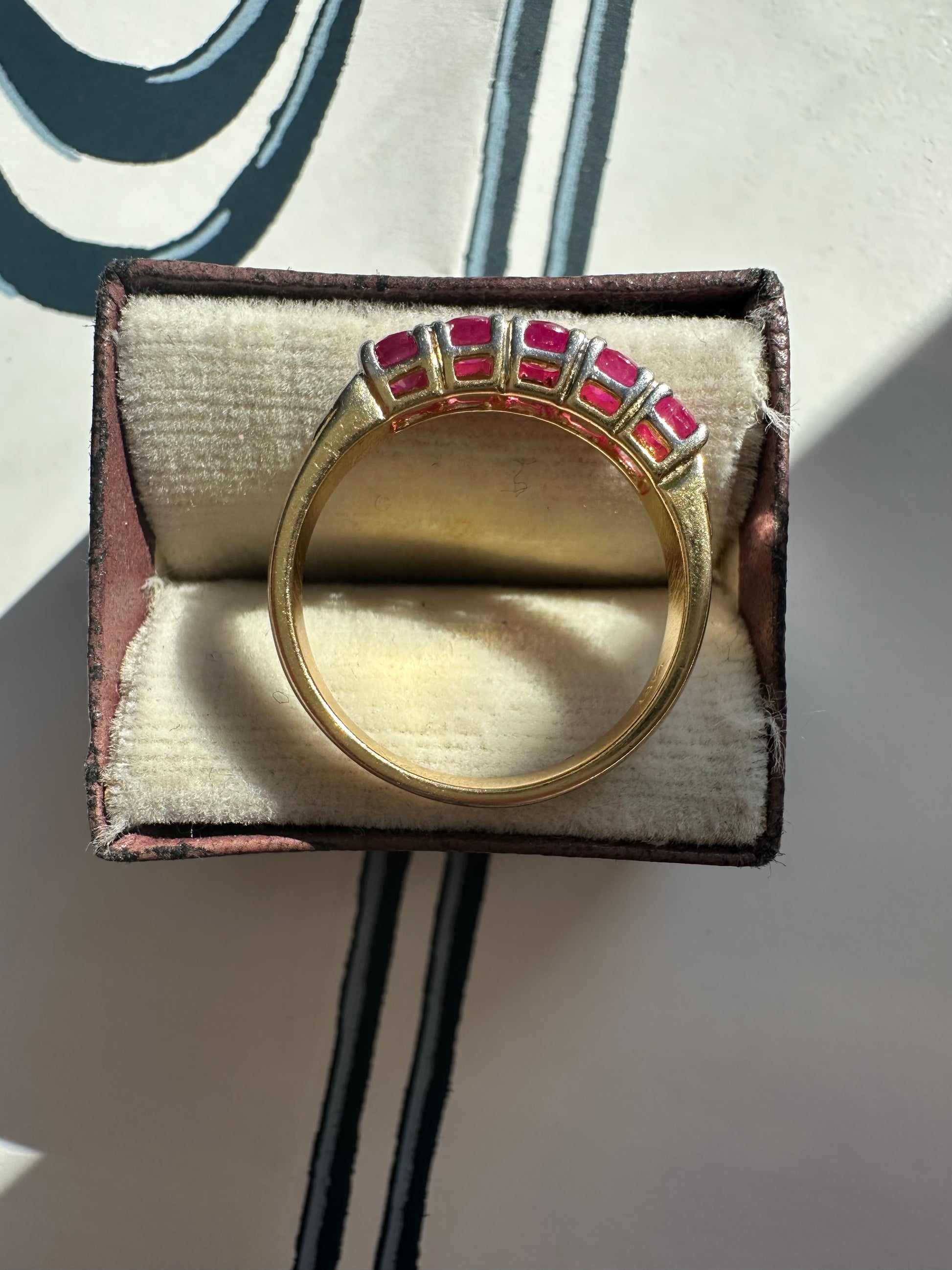 ruby band set in 18k yellow gold