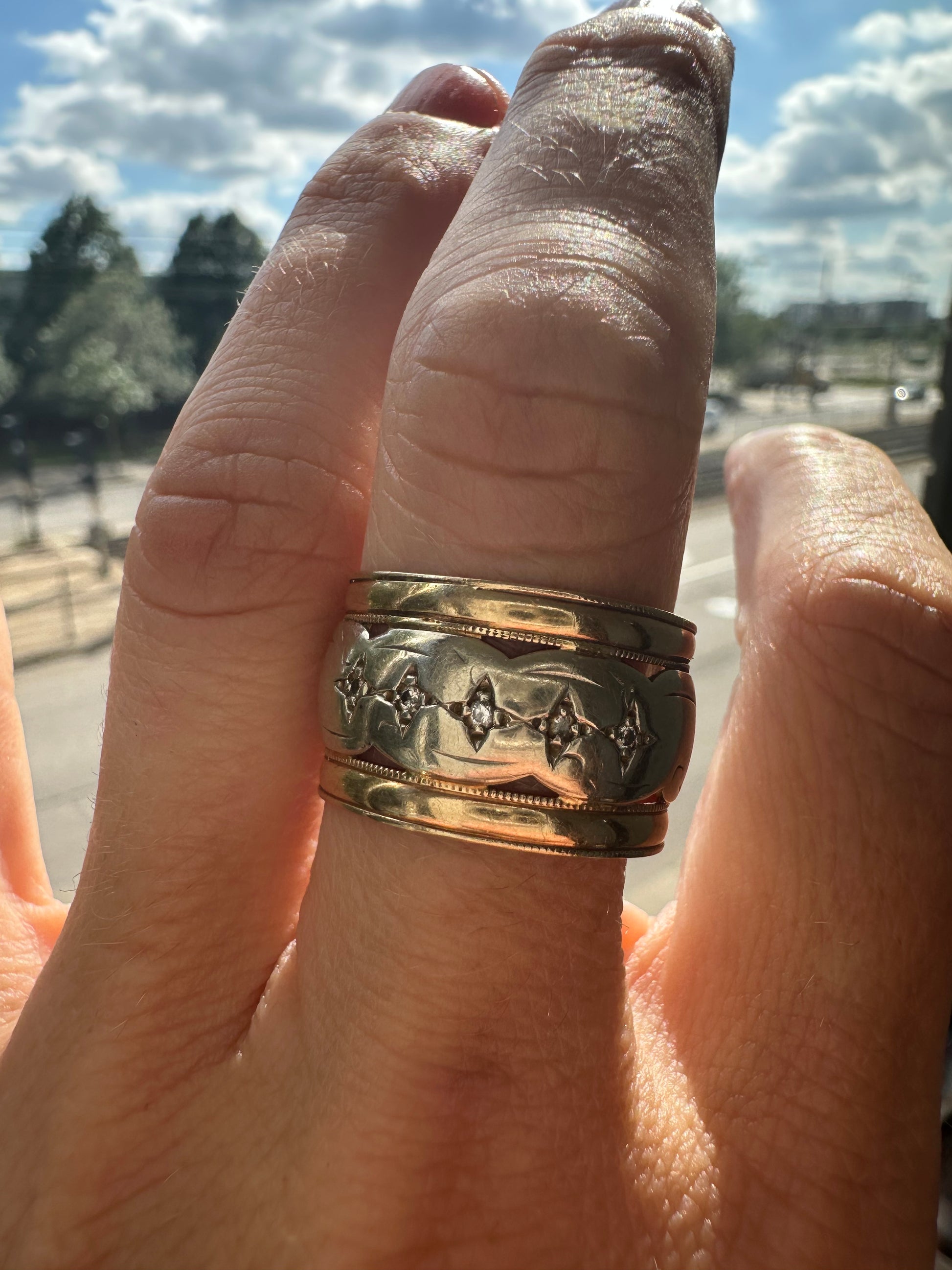 wide two tone band with star set diamonds