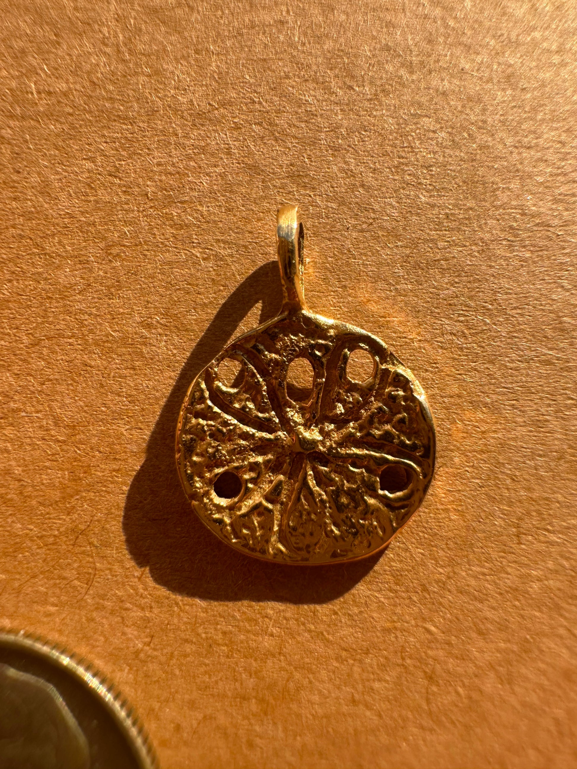 sanddollar - zuni bear - fluted clover charm