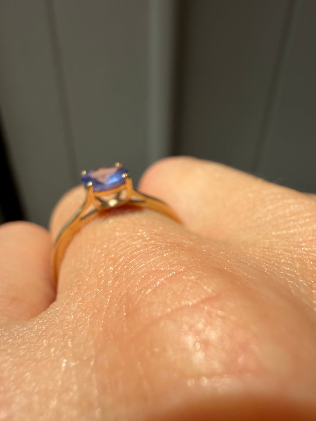 round cut solitaire tanzanite in 9k gold