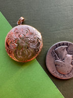 round floral engraved disc
