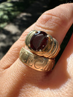 oval garnet in ribbed gold