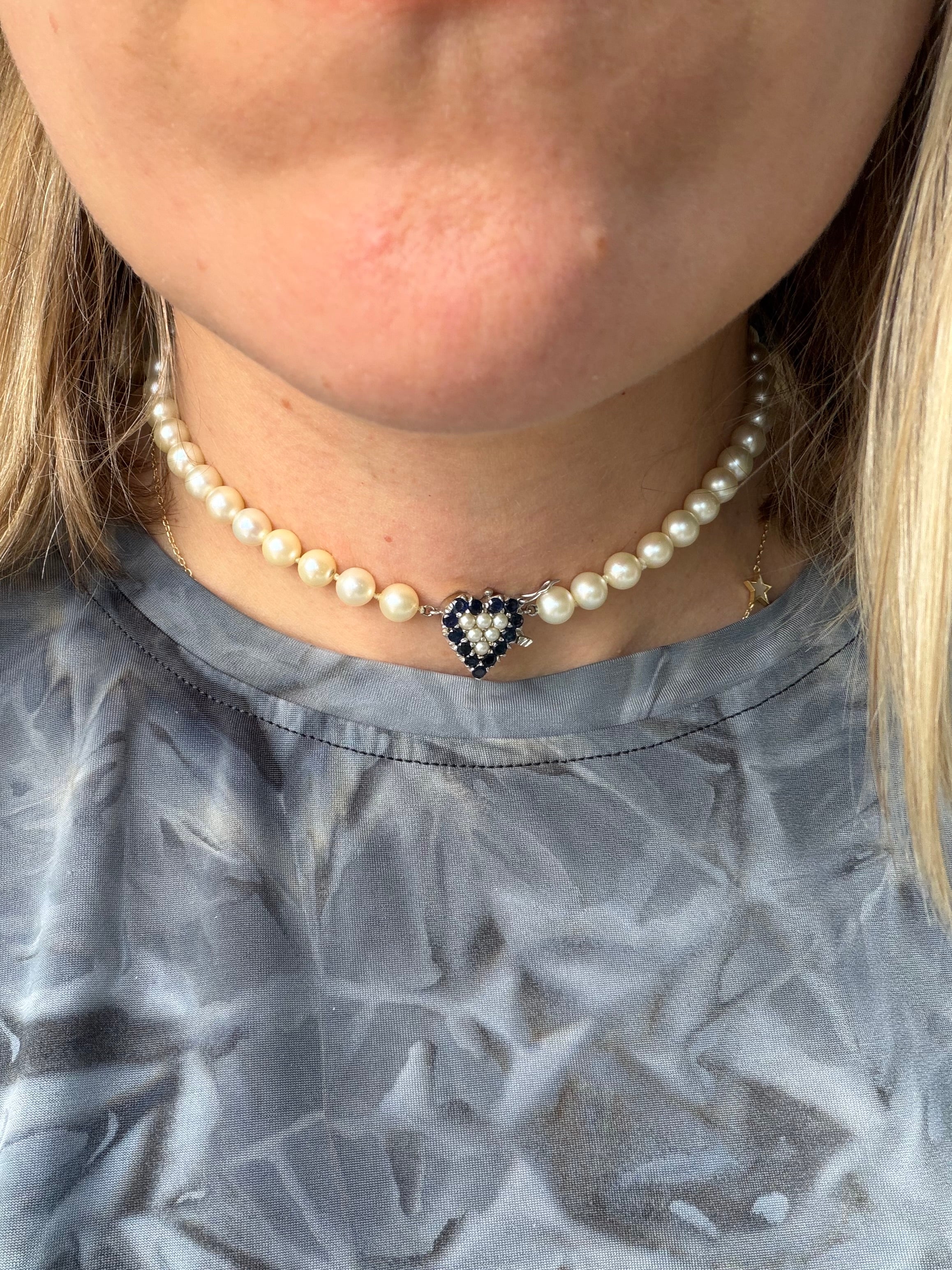 pearl strand with sapphire and pearl heart white gold clasp
