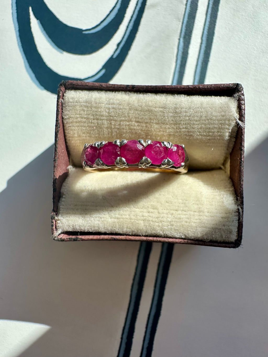ruby band set in 18k yellow gold